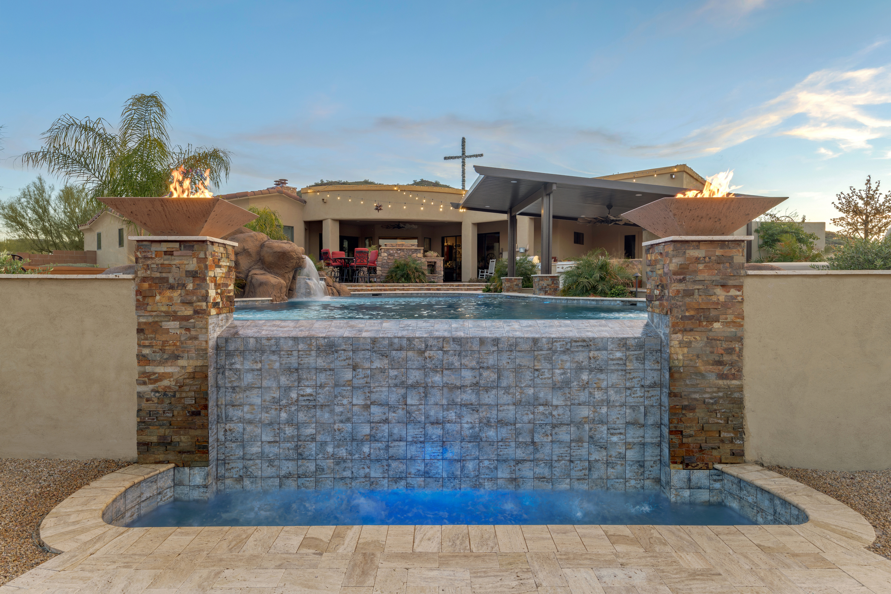 Pool Design Feature of a water spillover in pool